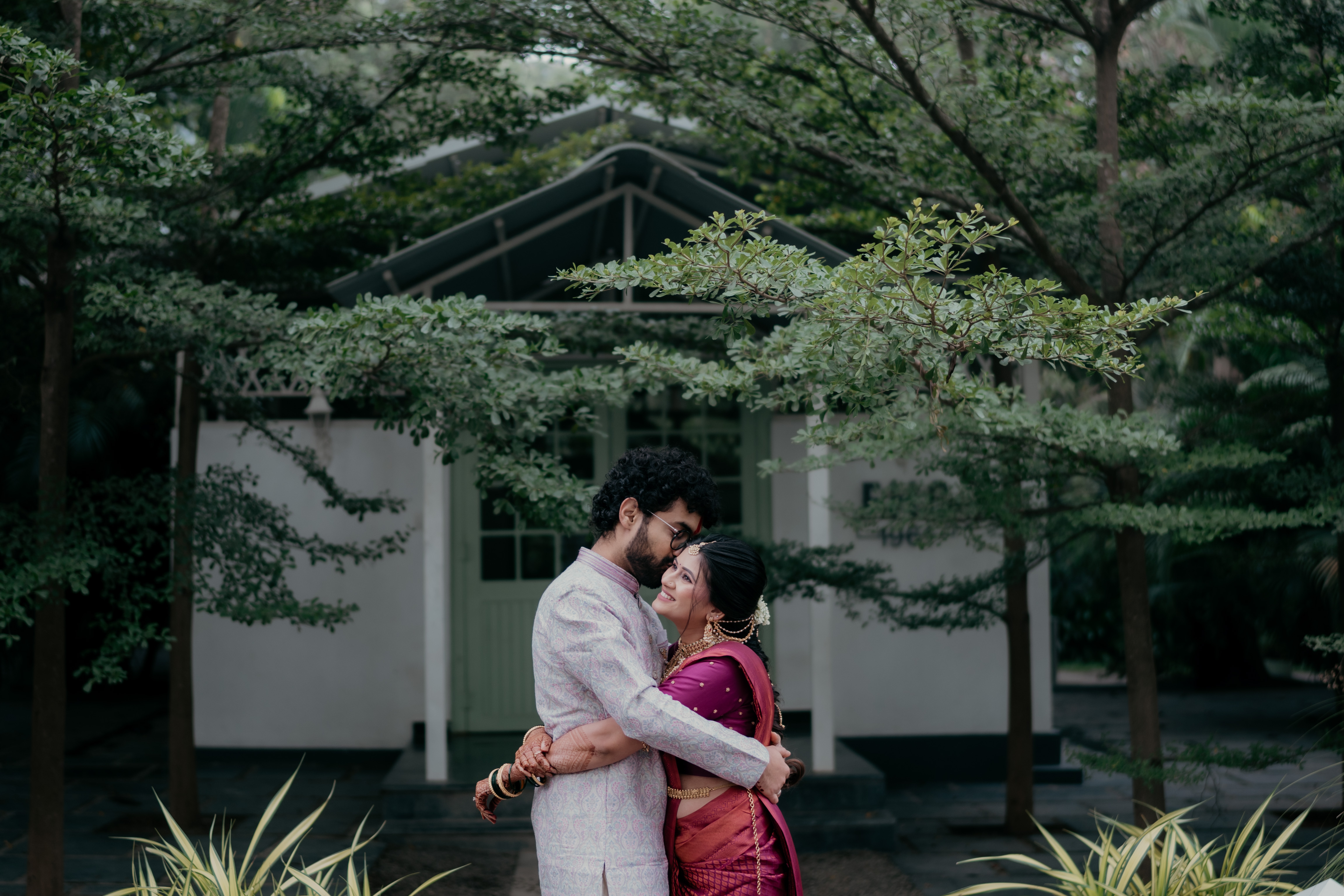 Happy couple celebrating with photographer